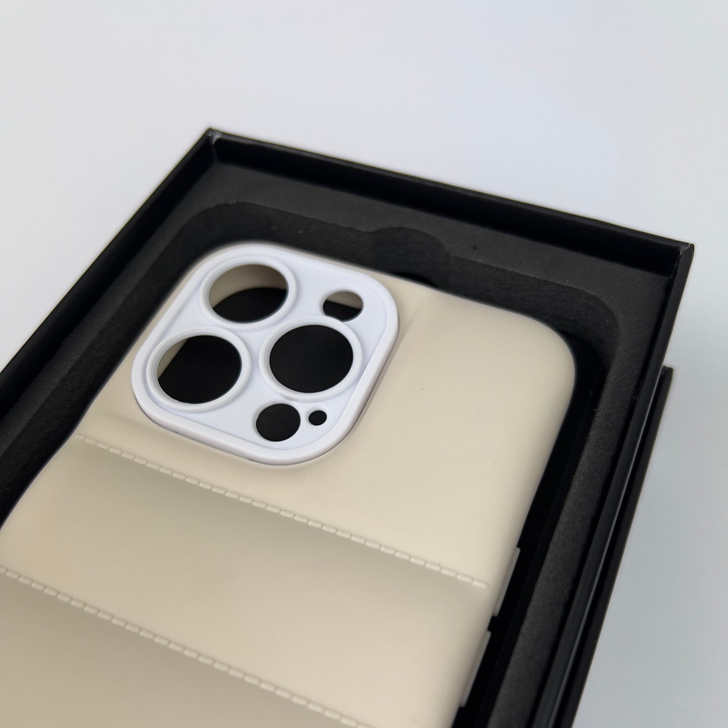 CREME WHITE PUFFER CASE